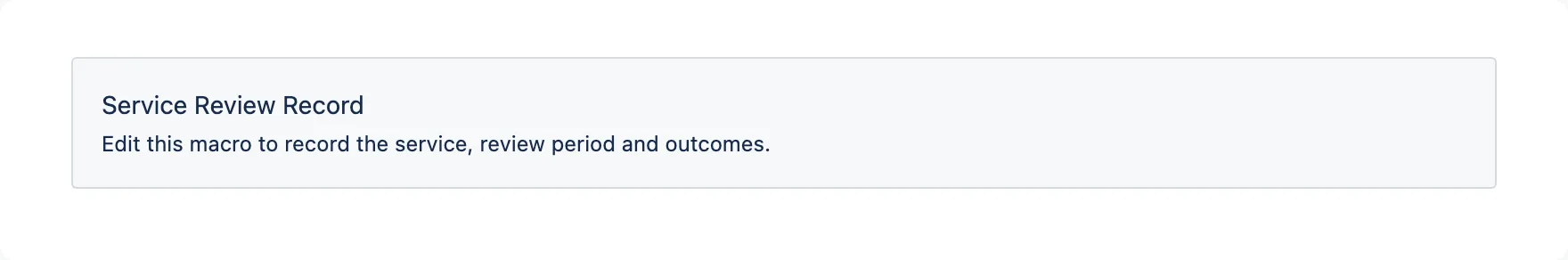 An unconfigured Service Review Record macro: a plain grey box with the macro name and a one-line hint.